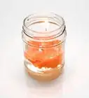 hacer velas usando frascos de vidrio