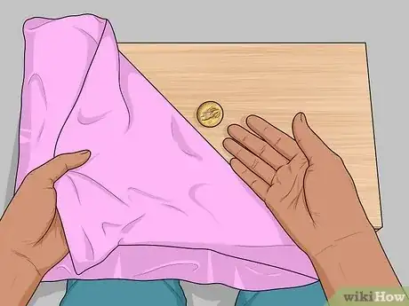 Image intitulée Make a Coin Disappear Step 25