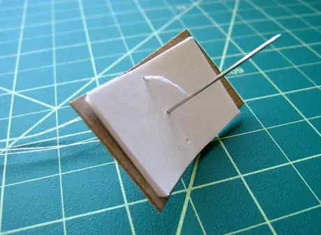 Image intitulée Stitch up through the middle hole.