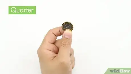 Image intitulée Make a Quarter Disappear Step 11
