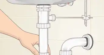 remplacer le clapet d'un lavabo