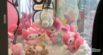 attraper une peluche avec une machine à pince