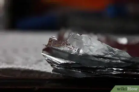 Image intitulée Curl Your Hair With Aluminum Foil Step 4