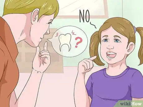Image intitulée Pull a Loose Tooth at Home Step 2