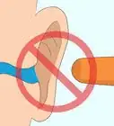faire sortir l'eau des oreilles