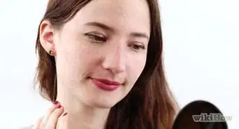 mettre des boucles d'oreilles