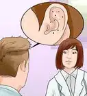 se dérrasser des boutons à l'intérieur de vos oreilles