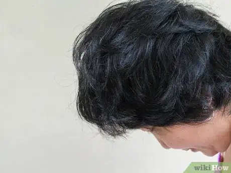 Image intitulée Create a Turban With a Towel to Dry Wet Hair Step 4