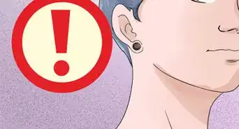 stretcher un piercing au lobe de l'oreille