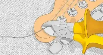 changer des cordes de guitare