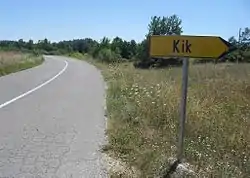 A sign at the entrance to the village Kik