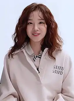 Song Yuqi in peach-colored outfit for an photoshoot in 2021