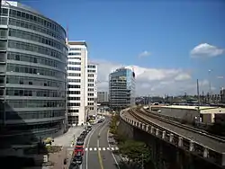 Facing north on First Street, N.E., in "NoMa."  The Washington Metro's Red Line track is visible on the right-hand side.