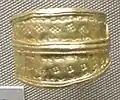 Finger ring with punched decoration