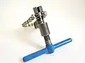 Assembling a bicycle chain with a chain tool