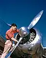 Mechanic with Lockheed Model 12 Electra Junior in 1940