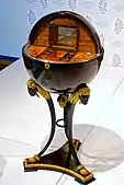 Globe-shaped work table; 1815-1820; maple veneer, bird's eye maple, fruitwoods, gilded and ebonized wood, mirror, brass; from Vienna; Montreal Museum of Fine Arts (Montreal, Canada)