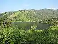 Image 58Bagakain Lake, also called Boga Lake is located in Ruma Upazila in Bandarban. It is a natural sweet and deep water lake situated nearly 1,246 feet (380 m) above sea level. The irregularly shaped lake is bounded on three sides by mountain peaks covered with thick bamboo bushes.Photo Credit: Masum Ibn Musa