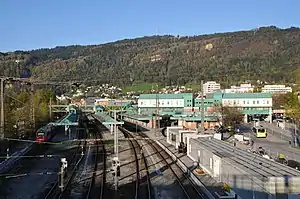 Multiple platforms connected by elevated structure