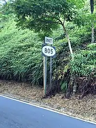 PR-803 near its junction with PR-805 in Palos Blancos barrio