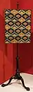 A fire screen in Rococo style.