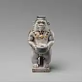 Cosmetic container; 525–404 BC; faience; height: 9.2 cm, width: 4.4 cm; Metropolitan Museum of Art