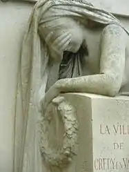 A close up of a section of the Crépy-en-Valois war memorial