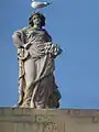 Statue of Demeter above Corn Exchange facade