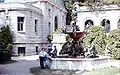Fountain outside mansion