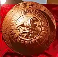 Dacian artifact from Piatra Roșie site. It is still a subject of debate if it is an umbo shield or a gate decoration.