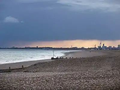 Image 18Hayling Island's mainly shingle beach with Portsmouth's Spinnaker Tower beyond (from Portal:Hampshire/Selected pictures)