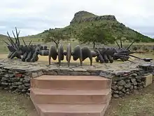 Image 7The monument to the Battle of Isandlwana depicts a beaded Zulu necklace similar to the one used for the original Wood Badge beads (from Wood Badge)