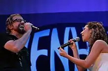 Ivonne Guzmán singing with Thedy Correa in 2007