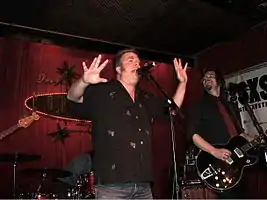 Mojo Nixon (left) at Continental Club in Austin, Texas. Photo – Ron Baker (2006).