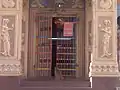 A monkey at the entrance of the Jakhu Temple