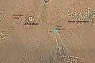 Map of Phoenicis Lacus quadrangle with major features labeled. This area contains two large volcanoes, Pavonis Mons and Arsia Mons, as well as the famous Noctis Labyrinthus canyon system.