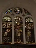 Stained glass window depicting Christ telling St. Peter: You are Peter and on this rock I will build my church