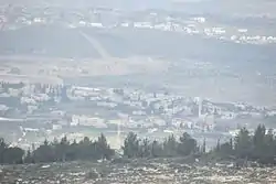 Saffa in the front,  Deir Qaddis behind