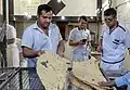 The baker is delivering the bread