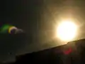 Lens flare used to capture details of too bright motive (partial solar eclipse).