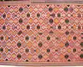 Detail of songket sarong. Woven on a narrow back-strap loom and then joined