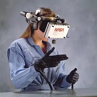 Image 1An operator controlling The Virtual Interface Environment Workstation (VIEW) at NASA Ames (from Virtual reality)