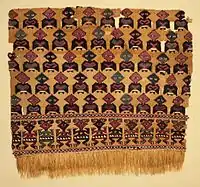 Fragment ofslit tapestry with eccentric weave and applied fringe, 1000–1470, camelid fiber and cotton, 16.mw-parser-output .frac{white-space:nowrap}.mw-parser-output .frac .num,.mw-parser-output .frac .den{font-size:80%;line-height:0;vertical-align:super}.mw-parser-output .frac .den{vertical-align:sub}.mw-parser-output .sr-only{border:0;clip:rect(0,0,0,0);clip-path:polygon(0px 0px,0px 0px,0px 0px);height:1px;margin:-1px;overflow:hidden;padding:0;position:absolute;width:1px}3⁄4 x 18 in., Los Angeles County Museum of Art
