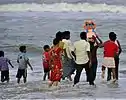 Immersion of Ganesha idols in the sea.