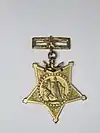Front side of Pelham's medal