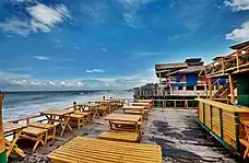Image 59Cox's Bazar in Bangladesh known for its wide sandy beach, is believed to be the world's longest (120 km) natural sandy sea beach. It is located 152 km south of Chittagong. The photo features a beach restaurant at Cox's Bazar.Photo Credit: Xalan mustafa