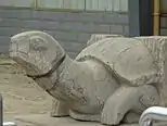 A stele-bearing turtle; tomb of Xiao Xiu