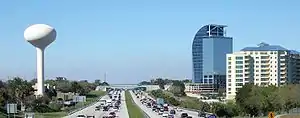 Skyline of Altamonte Springs viewed from Interstate 4, with the unfinished Majesty Building (often called "the Eyesore on I-4") in the background.