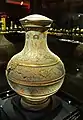 Painted pottery pot with raised reliefs of dragons and phoenixes, Western Han dynasty (202 BC – 9 AD)