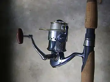 An open faced spinning reel